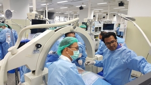 Photo : Dr Priyank Uniyal teaching students in a Spine Surgery Cadaveric course in Thailand